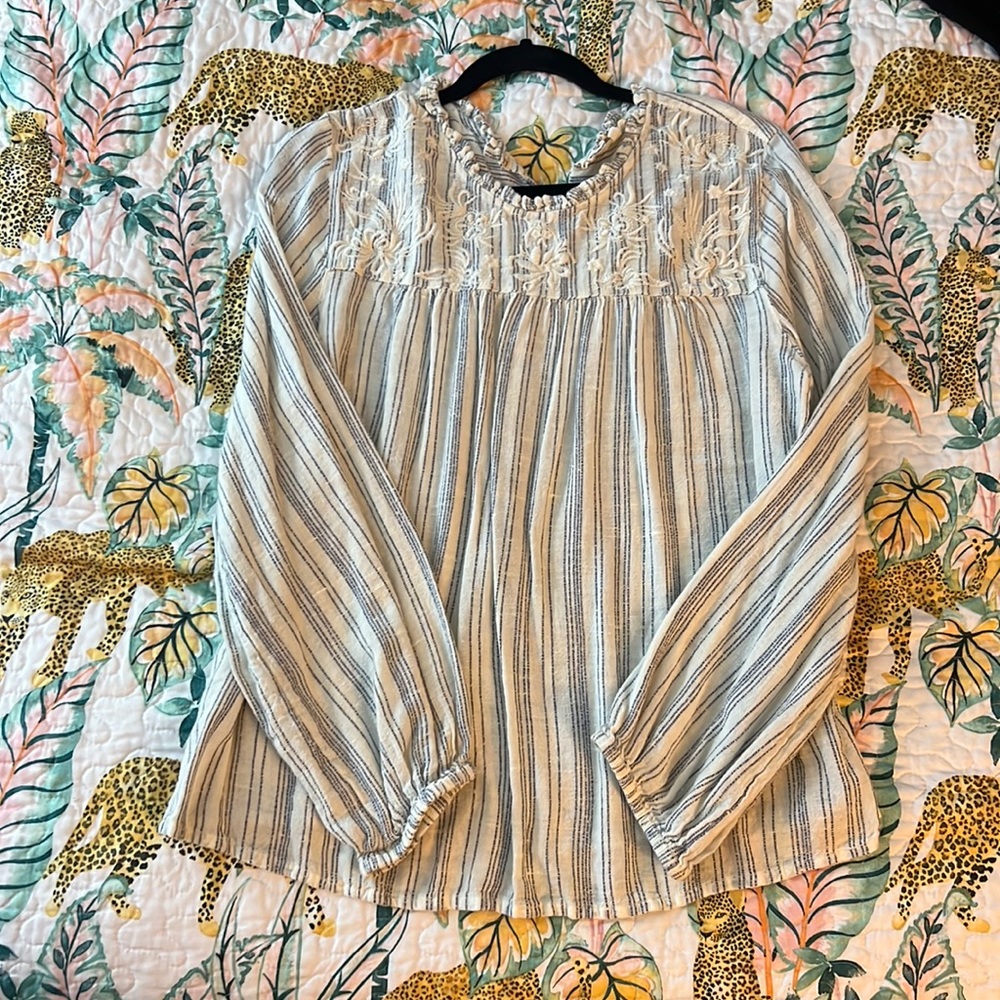 Long sleeve cream colored top with stitched front